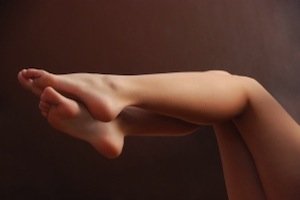 woman's legs and feet